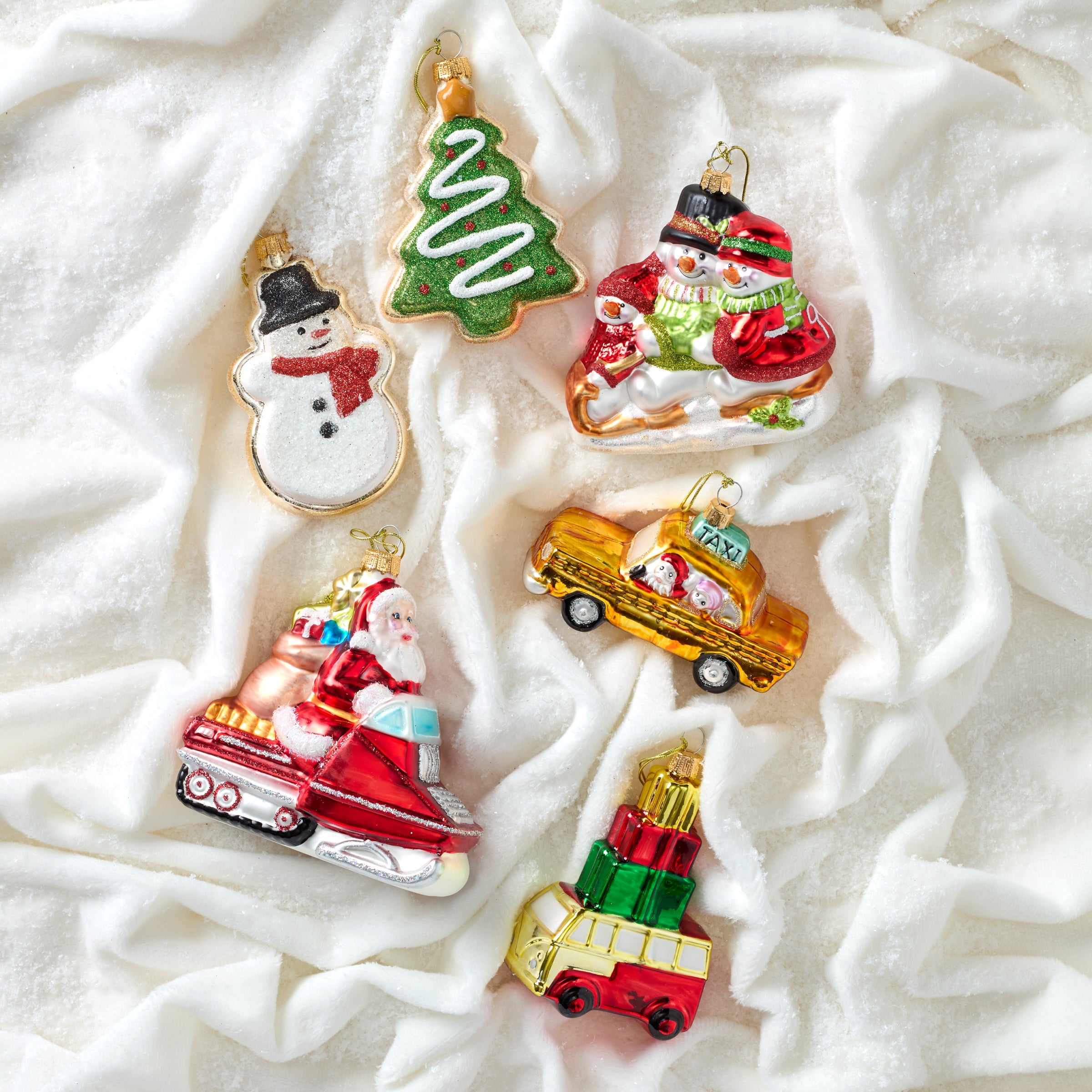 Blown Glass Santa On Snowmobile Ornament - Image 2